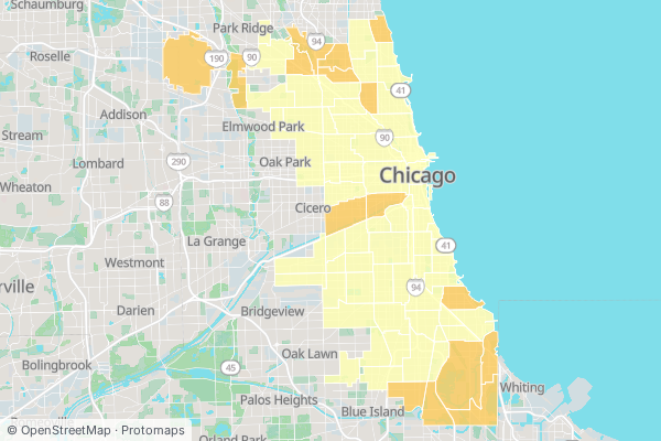 Which community areas have the most parcels in a FEMA flood zone?